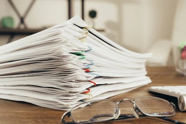 A Close-Up Shot of Paper Clipped Documents A Close-Up Shot of Paper Clipped Documents